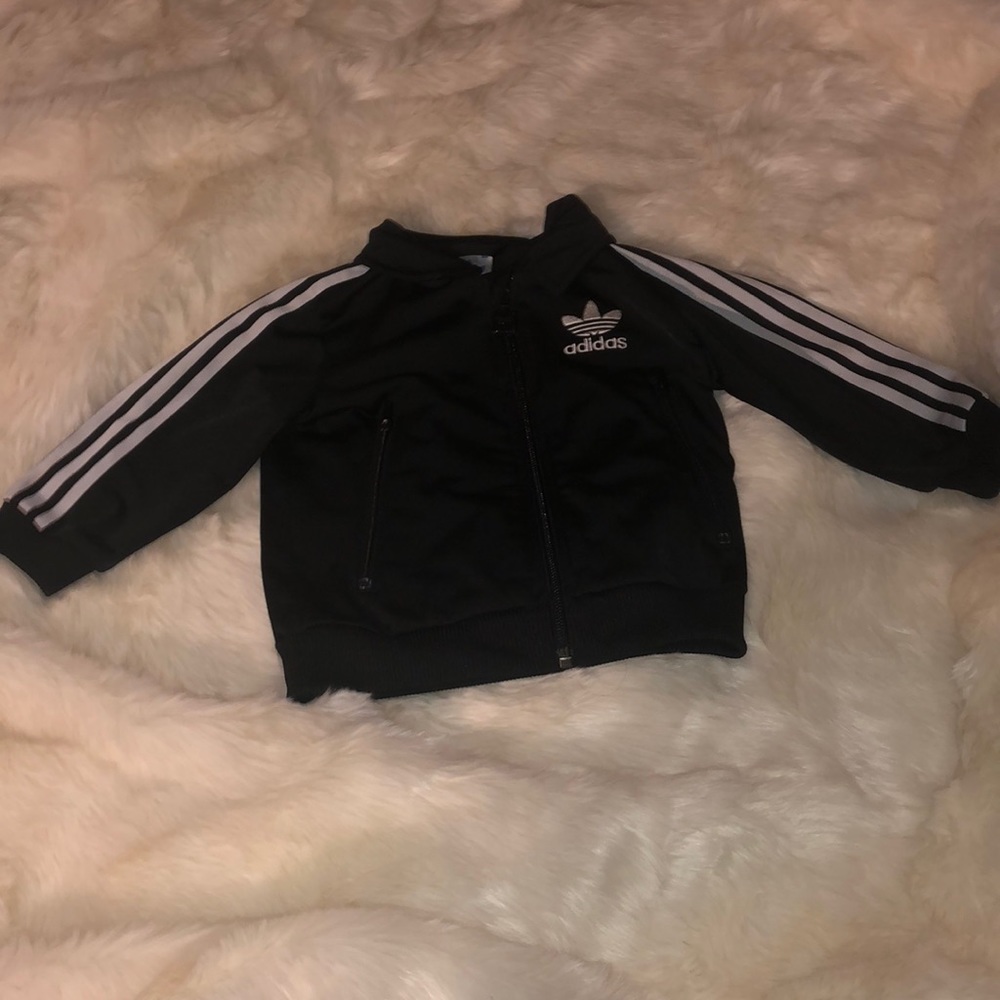 Adidas Black and White track jacket.